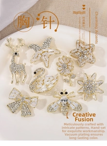 Detailed close-up of eight gold-plated zircon brooches in elegant animal and floral shapes