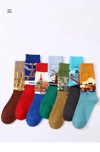 Flat lay macro view of assorted world landmark printed mid-tube cotton socks in white