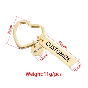 Detail view of gold stainless steel keychain charms with precise size measurements