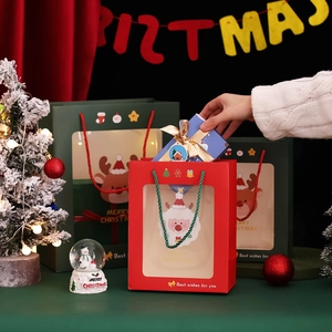 Christmas gift bag with transparent window and cartoon Santa Claus print