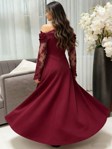 Elegant burgundy off-the-shoulder evening gown with lace long sleeves and a flowing skirt