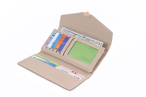 Detail view of beige envelope wallet showing multiple card slots and spacious interior