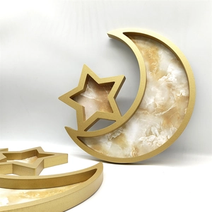 Golden moon and star food tray set with elegant marble texture pattern for festive decor
