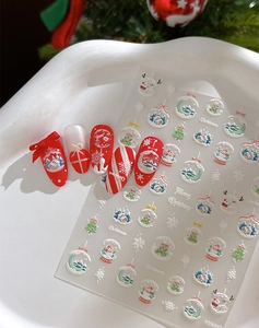 Detailed 5D embossed Christmas nail stickers featuring red snowmen and white snowflakes