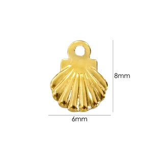 Detailed macro view of 14K gold shell pendant showing 8mm height and 6mm width dimensions