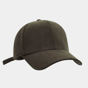 Detail view of dark olive corduroy baseball cap with six-panel design and adjustable strap