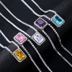 Rectangle zircon necklaces in five colors with a full diamond tennis chain on black stand