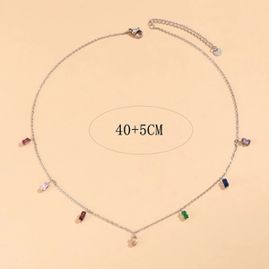 Close-up of silver necklace with seven multicolored rectangular zircons and 40+5CM chain