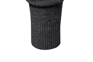 Close-up of dark grey knitted ribbed cuffs on a men's V-neck sweater with sharp texture