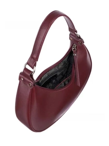 Detailed interior of a wine red crescent bag featuring fabric lining and zipper closure