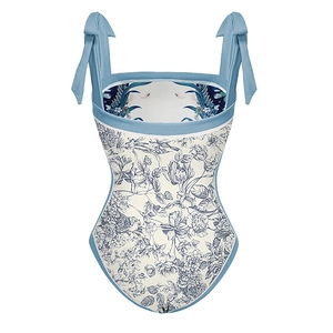 Detail of floral one-piece swimsuit with blue toile de jouy print and shoulder ties