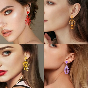 Artistic geometric acrylic earrings in four abstract designs worn by a model