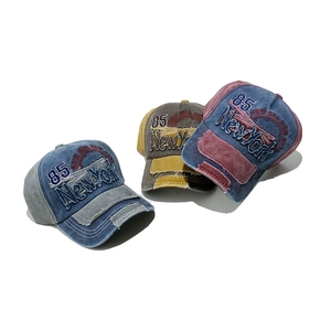 Vintage washed cotton baseball caps with New York 85 embroidery in multiple colors