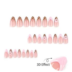 3D almond press-on nails with leopard French tips and pink embossed floral accents