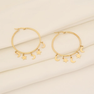 Elegant gold celestial hoop earrings with dangling crescent moon and star charms