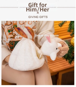 Close-up of soft plush white bear peeking from a quilted nest base as a holiday gift