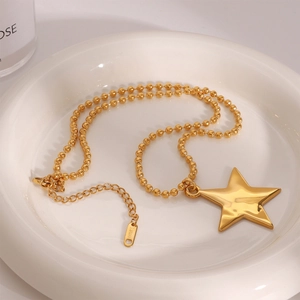 Elegant gold-plated stainless steel bead chain necklace featuring a polished star pendant