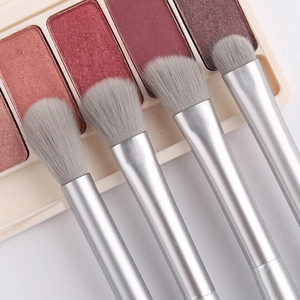 Detail view of 4-piece professional eye shadow brushes with soft grey fiber bristles