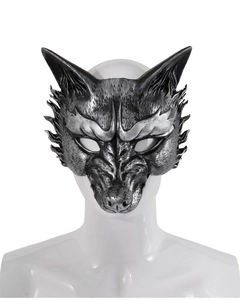 Detail of silver wolf mask showing intricate faux fur textures and metallic finish on a model