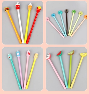 Detail view of assorted creative gel pens featuring colorful silicone food-shaped toppers