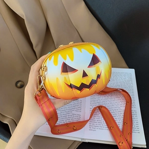 Close-up of Halloween pumpkin round bag with yellow gradient finish and printed strap