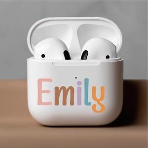 Customized white wireless headphones set with personalized Emily name print in a charging case