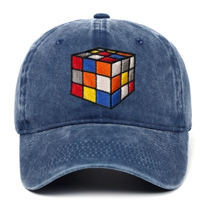 Close-up of colorful Rubik's cube embroidery on washed blue denim baseball cap