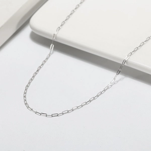 Minimalist S925 sterling silver paperclip link necklace on a clean white display stand