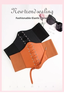 Detail of vintage elastic corset belt with retro lace-up design and metal eyelets