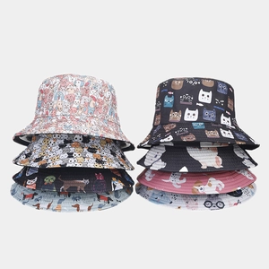 Detailed selection of bucket hats with various cartoon animal prints and colorful patterns