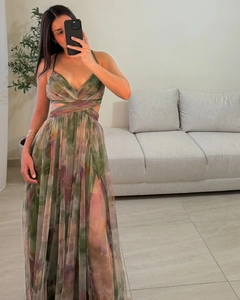 Detail of floral mesh dress with deep V-neckline and high side slit design