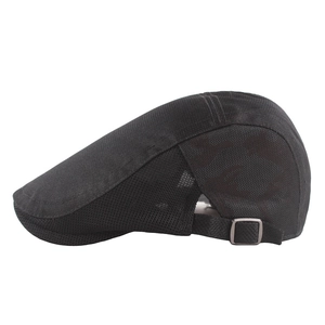 Detail view of breathable black mesh newsboy cap with adjustable metal side buckle