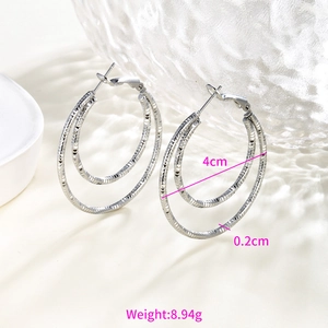 Detailed view of 4cm silver double hoop earrings with textured finish and 8.94g weight