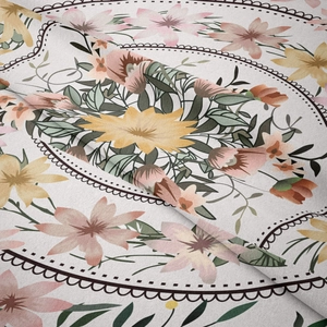Detail of floral tapestry fabric with pink flowers and green leaves on soft texture