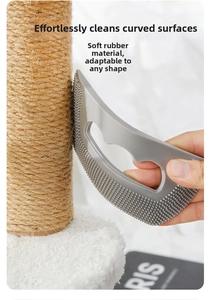 Detail view of the gray soft rubber pet hair scraper cleaning curved surfaces