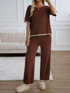 Brown knit loungewear set featuring short sleeve top and pants with beige trim detail