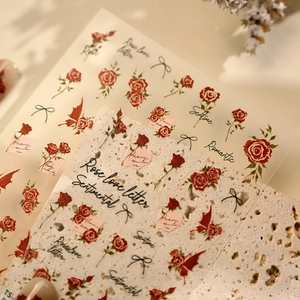 French retro rose nail art stickers with vintage red floral and bow tie patterns