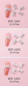 Three styles of hollow alloy bow nail charms with pearls and rhinestones 10.5x7mm