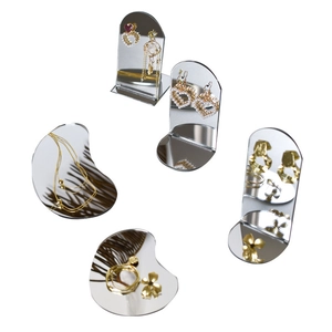 Minimalist silver mirror jewelry display stands with arch and irregular bean shapes