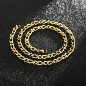 Men's retro gold-toned twisted rope chain necklace on a minimalist black background