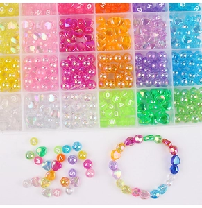 Detail showing 24-grid box with colorful heart and alphabet acrylic beads for DIY jewelry
