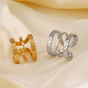 Three-layer open ring in gold and silver finish with hammered texture on stainless steel