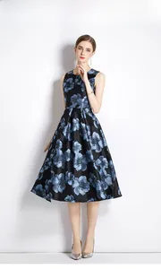 Close-up of sleeveless A-line dress with blue floral jacquard on black satin fabric