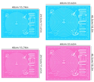 Detail of blue and pink silicone baking mats showing conversion charts and dual sizes