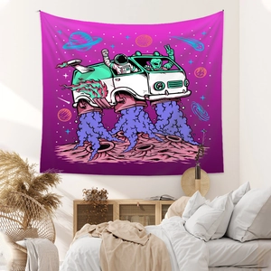 Close-up of sci-fi astronaut and alien space bus tapestry in a cozy purple bedroom setting