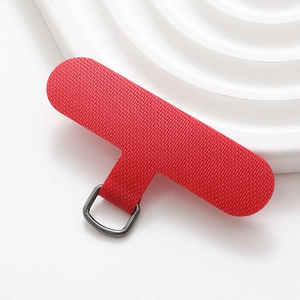 Macro shot of durable red woven phone lanyard patch with high-quality metal D-ring