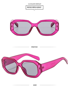 Macro detail of rose red polygon sunglasses with size 51-18-138 markings on inner temple
