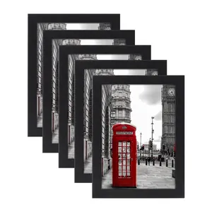 Modern 5-piece black photo frame set featuring London telephone booth art prints