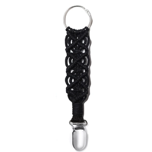 Close-up of black braided strap with metal ring and duckbill clip for hat holder