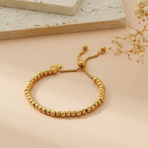 Adjustable Gold Stainless Steel Heart Charm Bead Bracelet For Men And Women With Textured Embossed Metal Beads